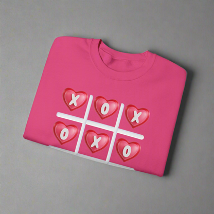 Image: XOXO Sweatshirt in Hot Pink, this crewneck pullover features a tic tac toe graphic with XOXO in 3D Conversation Hearts. Ideal as a teen gift for her or Galentines day. Available in Hot pink, light pink and black, by jaecrece