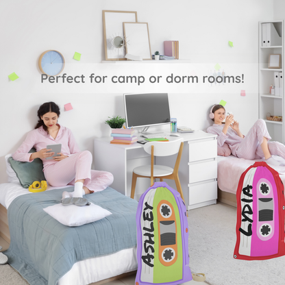 Two people in a room with personalized sleeping bags on beds, text 'Perfect for camp or dorm rooms'.