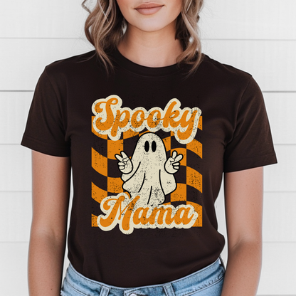 Black Spooky Mama Halloween shirt printed on a soft Gildan 64000 Softstyle unisex tee featuring cute spooky season lettering for moms who love fall fashion. Lightweight ring spun cotton tshirt perfect for pumpkin patch visits, trick or treat nights, haunted house trips, school parties, coffee runs, and cozy autumn outfits. Cute Halloween mom shirt pairs with leggings, jeans, flannel, and boots. Great gift for moms, wives, sisters, friends. Free U.S. Shipping.