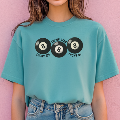 Comfort Colors 1717 Lucky Me Lucky You Lucky Us tee in seafoam with three black billiards 8 balls centered on front chest. Relaxed fit cotton shirt with garment dyed softness and boutique quality construction. Great trendy gift for couples, spouse, boyfriend, girlfriend, honeymoon pair, wedding weekend, or romantic celebrations. Viral inspired graphic tee that blends nostalgic charm, lucky symbolism, and casual everyday comfort.
