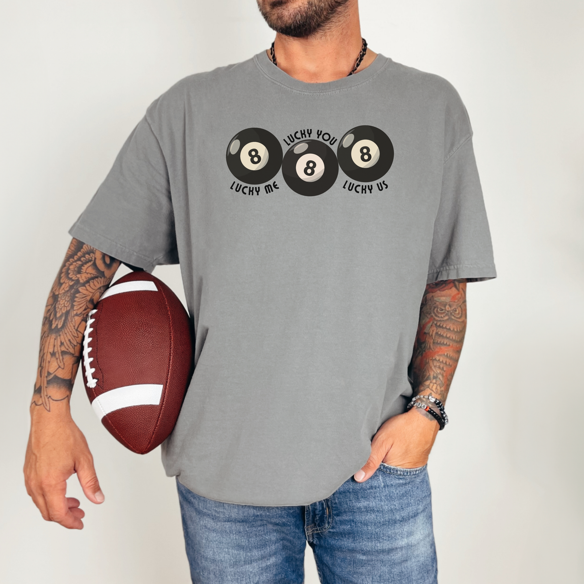 Ivory Comfort Colors shirt with Lucky Me Lucky You Lucky Us slogan and classic 8 ball design creates a trendy vintage inspired look. Soft cotton unisex tee with relaxed fit and premium garment dyed texture. Great for couples matching outfits, wedding season gifts, honeymoon travel, Valentine surprises, engagement celebrations, or everyday jeans and sneaker outfits. Stylish graphic tee with playful lucky energy and boutique quality feel.