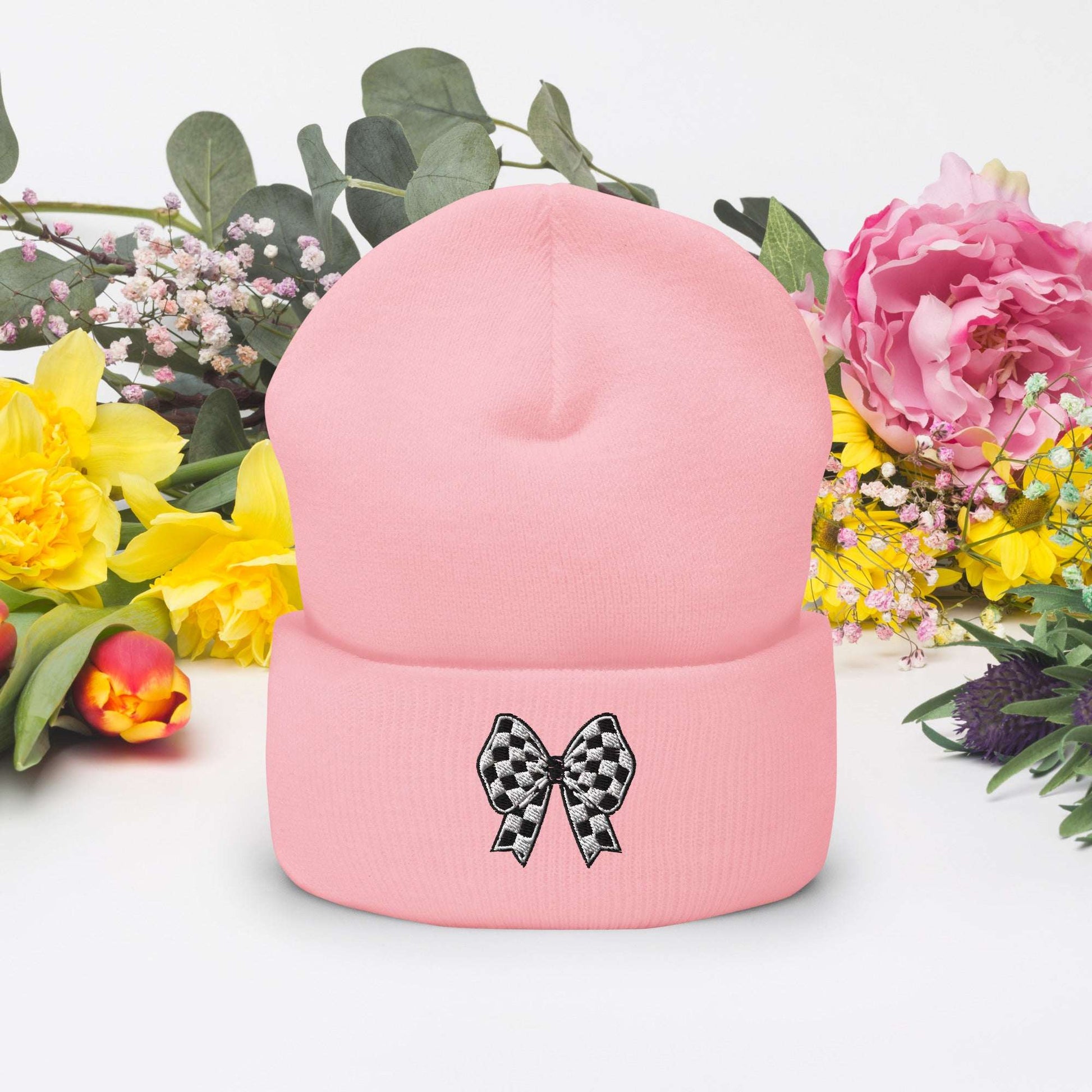 This Checkerboard Bow Beanie is your go-to winter essential, combining timeless comfort with modern charm. The embroidered black and white bow adds a subtle pop of style to your cold-weather look, while the soft acrylic fabric ensures warmth without bulk. Available in pink, white, red, dark grey, and spruce, it’s easy to match with any outfit. Perfect for daily errands, travel days, or cozy weekends, this cuffed hat makes casual dressing feel effortlessly chic.