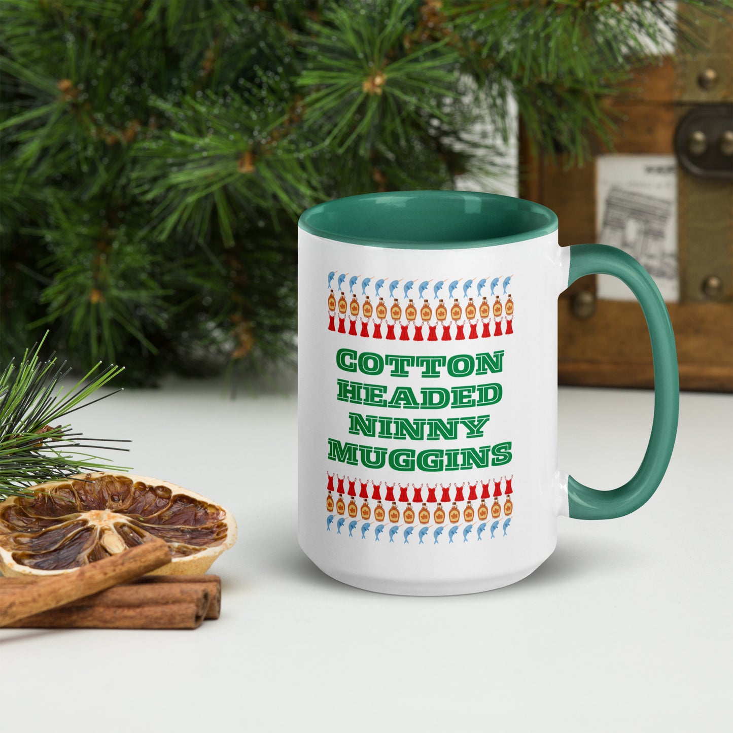 Funny 15 oz Christmas mug with “Cotton Headed Ninny Muggins” design, ideal for Elf fans and holiday coffee lovers. Features a colorful rim and handle, ceramic construction, and microwave/dishwasher safe durability. Makes the perfect quirky gift for Secret Santa, holiday brunch, or winter movie marathons with cocoa in hand.