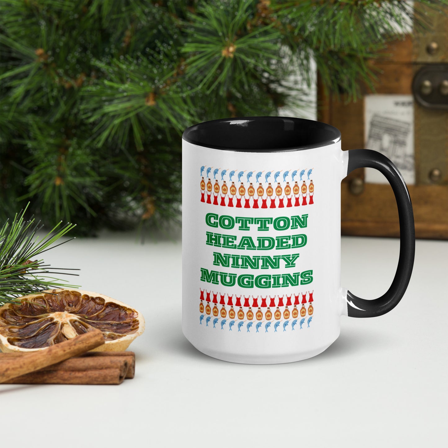 Funny Elf quote mug with “Cotton Headed Ninny Muggins” printed on a large 15 oz ceramic cup. Designed with a colorful rim and interior, this holiday mug makes the perfect gift for movie lovers, Christmas parties, and cozy winter mornings. Microwave and dishwasher safe, it’s a great option for hot chocolate, tea, or coffee. A must-have for fans of Elf and quirky holiday drinkware.