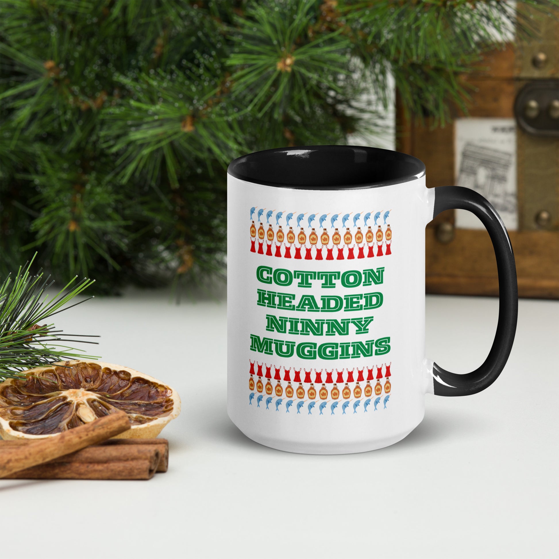 Funny Elf quote mug with “Cotton Headed Ninny Muggins” printed on a large 15 oz ceramic cup. Designed with a colorful rim and interior, this holiday mug makes the perfect gift for movie lovers, Christmas parties, and cozy winter mornings. Microwave and dishwasher safe, it’s a great option for hot chocolate, tea, or coffee. A must-have for fans of Elf and quirky holiday drinkware.