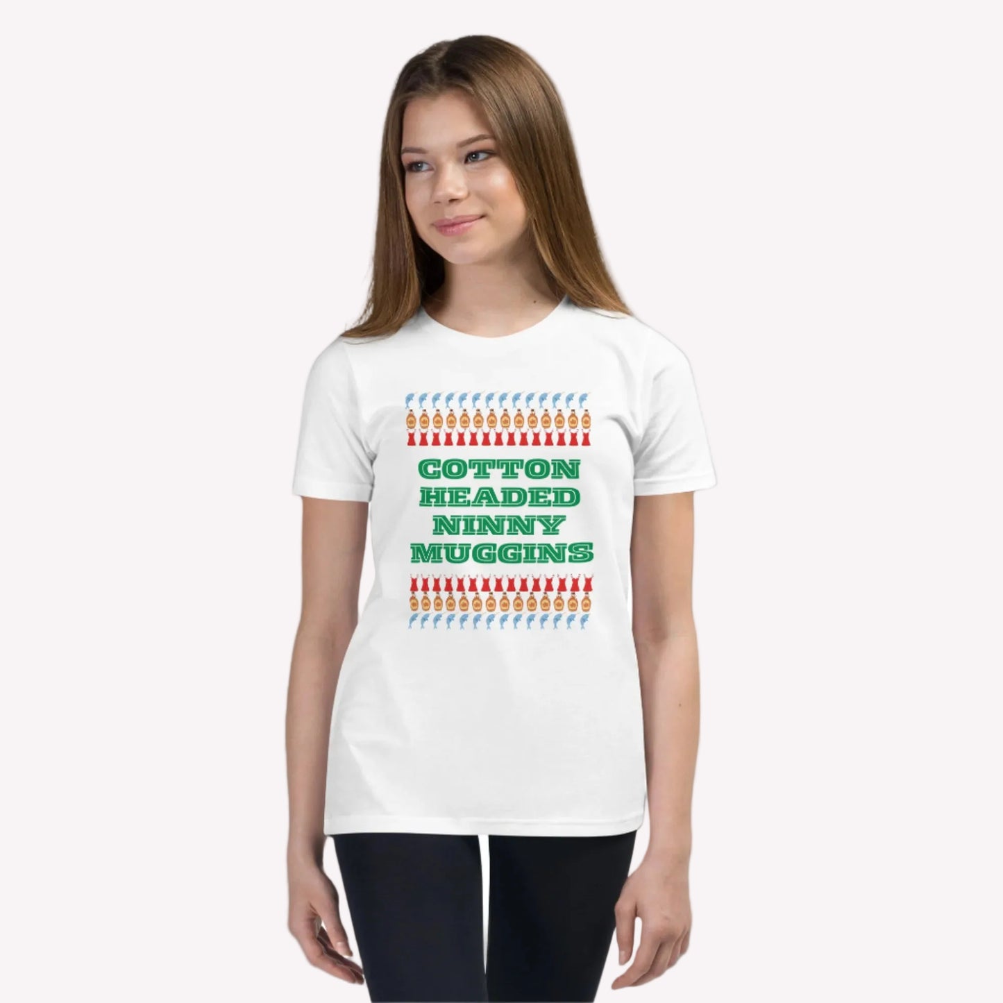 Youth short sleeve t-shirt featuring the funny “Cotton Headed Ninny Muggins” quote from the Elf movie. Made from soft, breathable cotton, this kids’ Christmas shirt is perfect for holiday parties, festive family gatherings, or casual everyday wear. A cozy and playful gift idea for boys and girls who love holiday humor and comfortable, stylish seasonal apparel.

