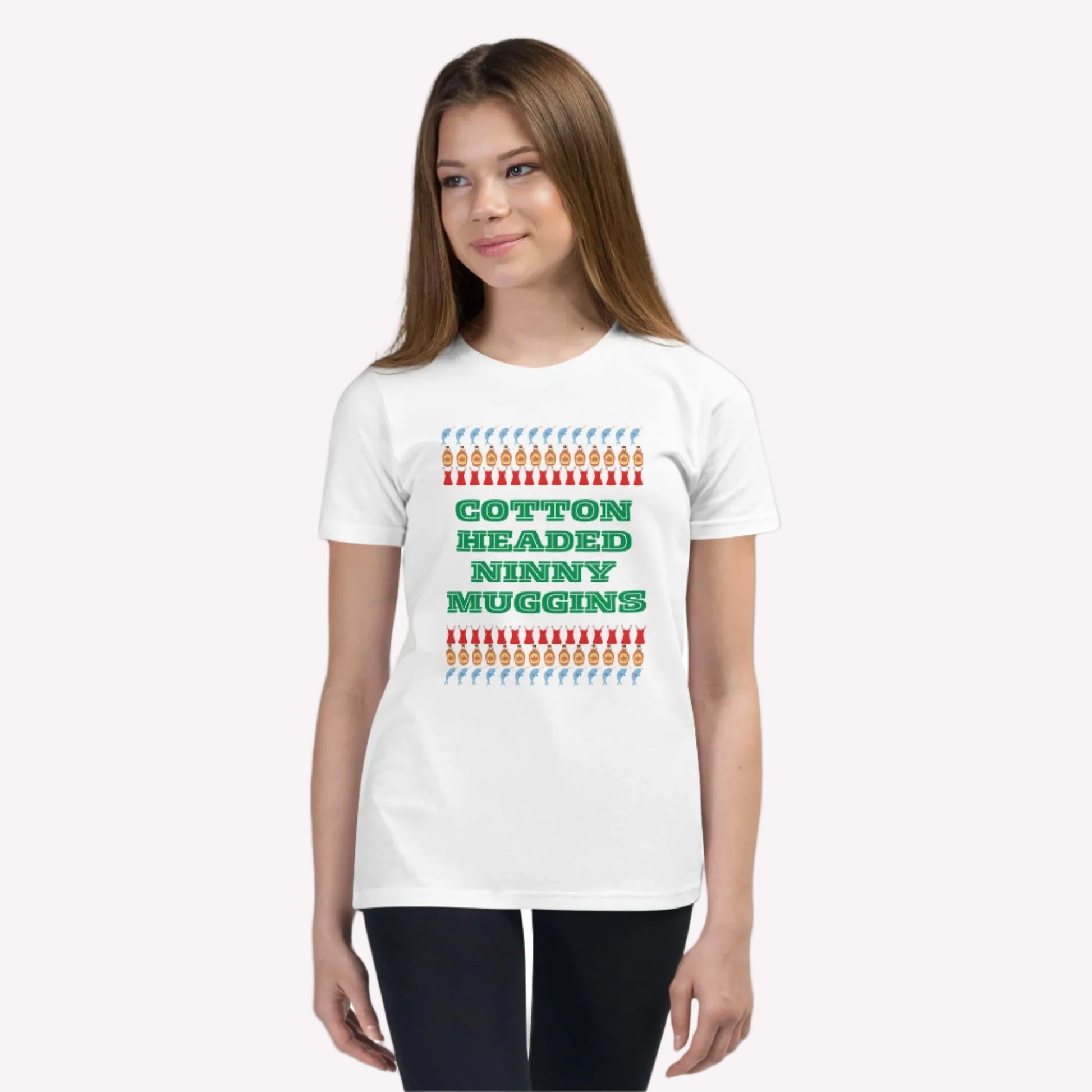 Youth short sleeve t-shirt featuring the funny “Cotton Headed Ninny Muggins” quote from the Elf movie. Made from soft, breathable cotton, this kids’ Christmas shirt is perfect for holiday parties, festive family gatherings, or casual everyday wear. A cozy and playful gift idea for boys and girls who love holiday humor and comfortable, stylish seasonal apparel.

