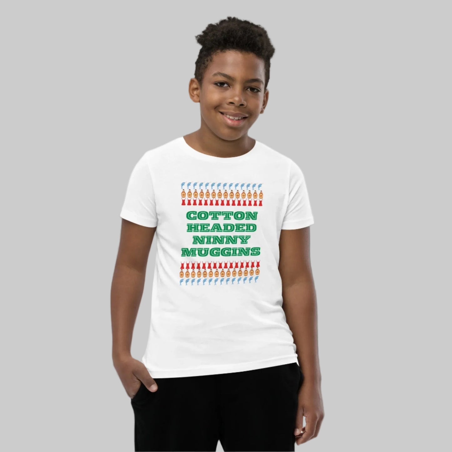 “Cotton Headed Ninny Muggins” youth tee in soft cotton fabric, designed for comfort and holiday fun. This short sleeve kids’ Christmas t-shirt is breathable and pre-shrunk for a perfect fit. Ideal for boys and girls attending holiday parties, Elf movie marathons, or Christmas family photos. Makes a playful and cozy gift for little ones who love festive humor.