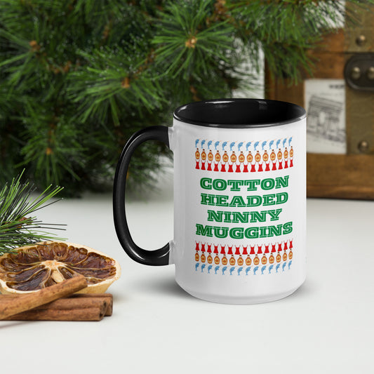 15 oz ceramic “Cotton Headed Ninny Muggins” mug featuring a colorful handle and interior, perfect for Christmas coffee or cocoa lovers. Inspired by the classic Elf movie, this funny holiday mug is dishwasher and microwave safe. A playful pop culture gift for festive mornings, secret Santa exchanges, or Elf fans who want to start the day with a warm drink and holiday cheer.