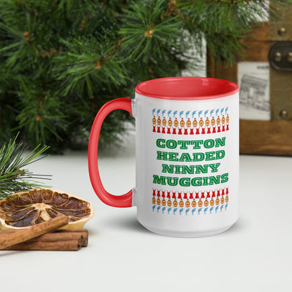 15 oz Elf quote mug with colorful accents and “Cotton Headed Ninny Muggins” printed on front. This holiday mug is a fun, festive way to enjoy cocoa or coffee during the Christmas season. Crafted from ceramic, safe for microwave and dishwasher use. Great for gifting, stocking stuffers, or cozy winter mornings with your favorite Christmas movie.