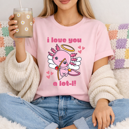 Pink Bella Canvas 3001 tshirt with the I Love You A Lot L Axolotl Cupid graphic showing an adorable cupid axolotl and sweet heart details. Soft unisex tee available in adult sizes XS to 5XL with child sizes for coordinating family looks. The pink shirt color adds a fun romantic feel that is perfect for Valentine season and year round wear. Comfortable lightweight top for brunch, school events, girls outings, casual days, or gifting to anyone who loves cute animal themed fashion.