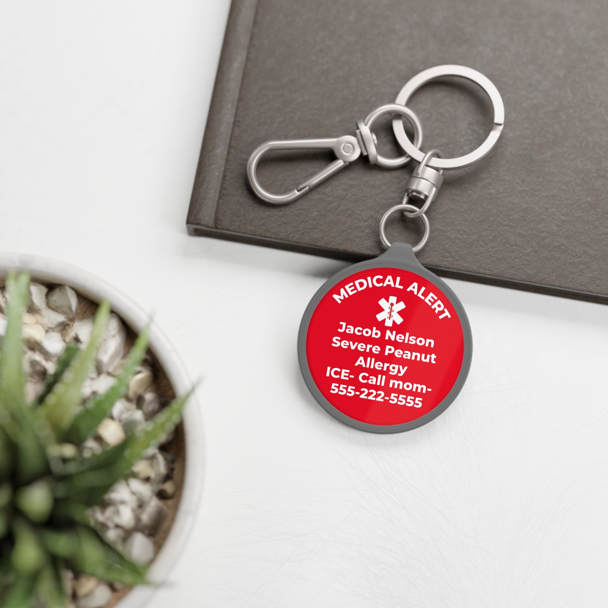 Custom medical alert keychain featuring a personalized medical ID tag that attaches to backpacks keys purses and bags. A simple way to keep essential health information nearby.