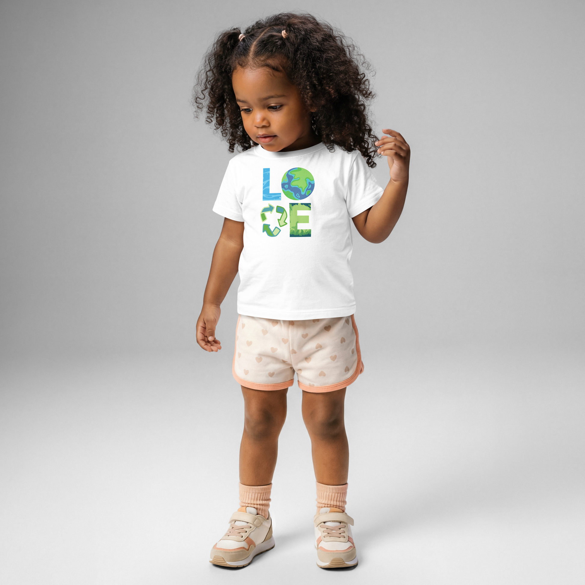 Cute baby Earth Day outfit featuring a white cotton tee with colorful environmental awareness design
