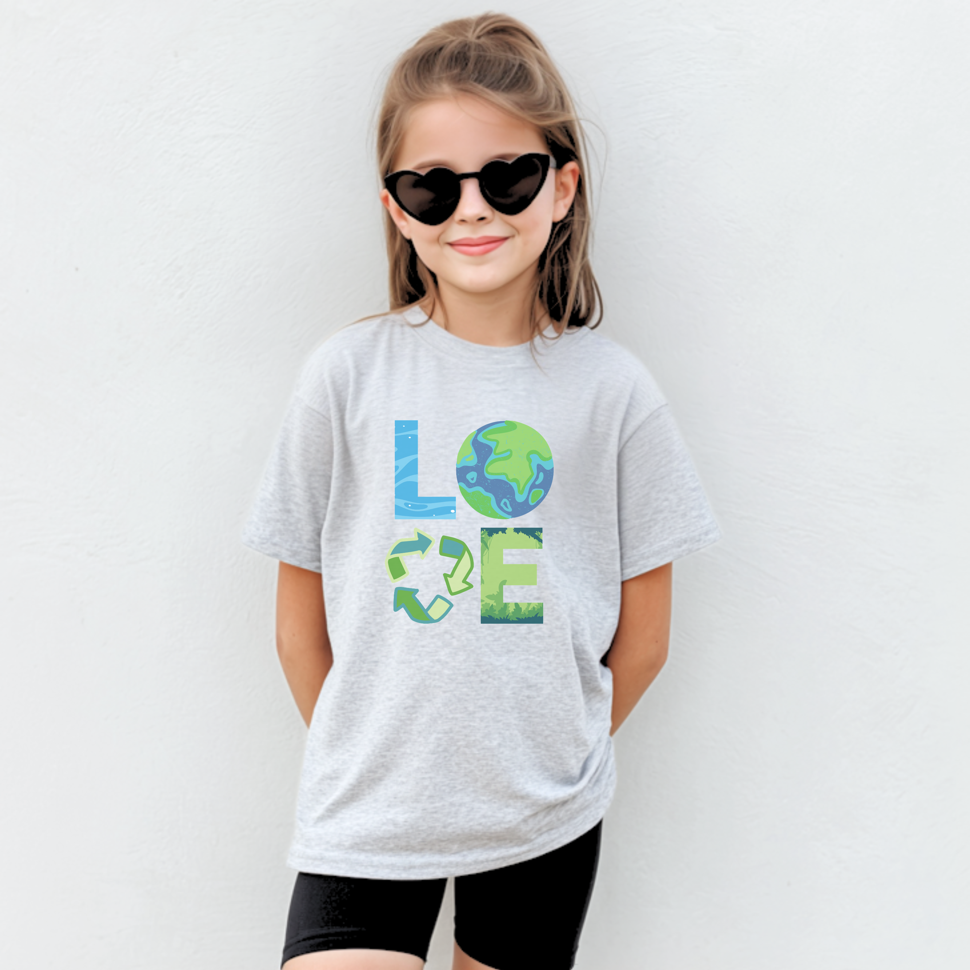 Cute kids Earth Day shirt featuring eco themed artwork celebrating Earth Day April 22 and promoting green living reduce reuse recycle and sustainable earth friendly habits. Youth unisex tee in sizes XS to XL in White Ash Heather Navy and Forest Green. Perfect for school Earth Day outfits classroom celebrations and mommy and me matching clothing sets. Soft comfortable everyday tee for nature loving kids.