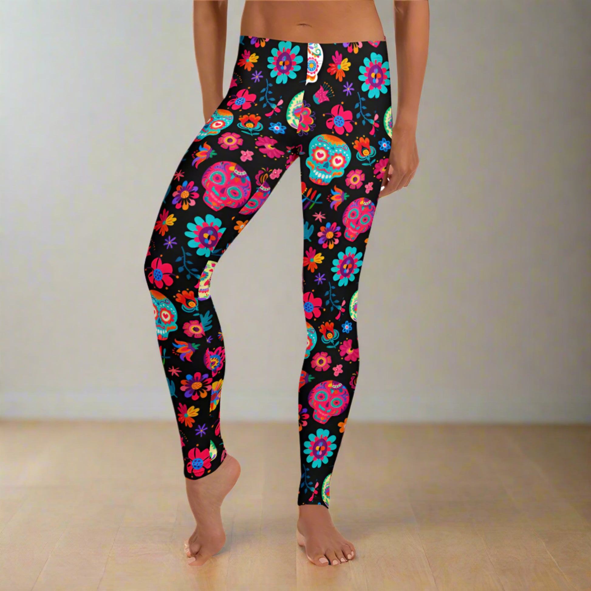Vibrant and festive, these Día de los Muertos leggings for women feature sugar skull artwork and floral accents that celebrate Mexican culture. Available in sizes XS–XL with a comfortable mid-rise waistband, they’re ideal for Halloween, fall parties, and themed classroom looks. Made from a soft, stretchy blend that moves with you. Coordinates with toddler and youth leggings for matching family outfits.