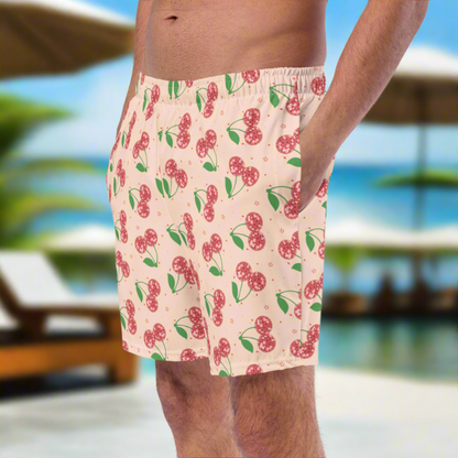 Men’s cherry print swim boxers in sizes 2XS to 6XL, offered in regular and plus sizes. These fun pink swim trunks feature red disco ball cherries and stars for a playful retro inspired look, making them great men’s beachwear for summer vacations, pool parties, cruises, beach days, and family matching swimsuits from JaeCrece.