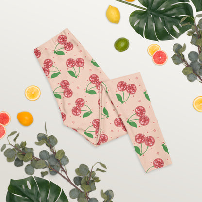 Disco cherry print womens leggings with bright pink background and sparkling disco ball cherries, full length mid rise leggings designed for casual outfits, travel wear, lounge days, athleisure style, women’s fashion, cherry aesthetic trends, and statement leggings with all day comfort