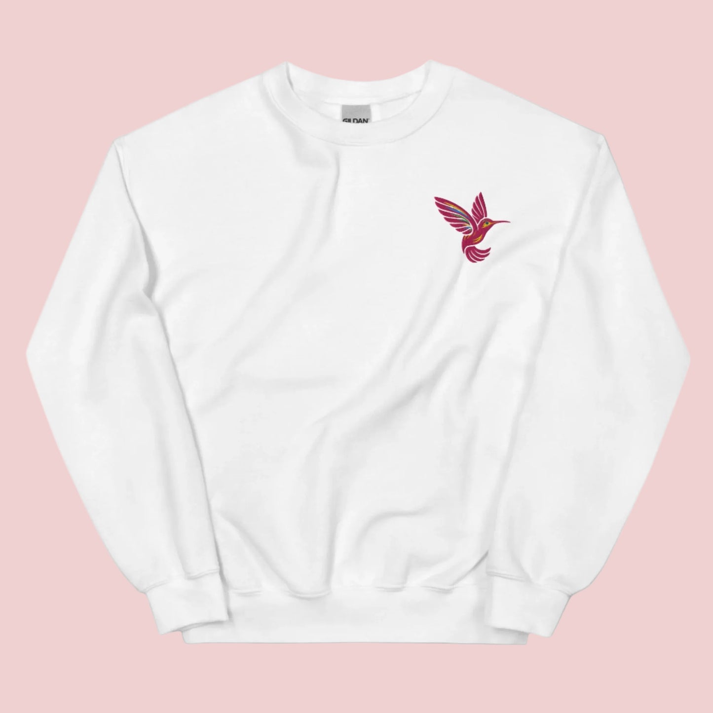 Embroidered bird sweatshirt with hummingbird design on soft unisex Gildan 18000 crewneck. Nature themed clothing with delicate stitching that adds charm to everyday outfits. Perfect for women who love floral and botanical aesthetic fashion. Ideal for gifting, casual wear, and cozy weekends. Comfortable cotton blend fabric available in sizes S to 5XL.