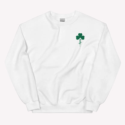 Embroidered shamrock holiday sweatshirt by JaeCrece featuring a classic white crewneck design, green lucky clover detail, and made to order small business apparel.