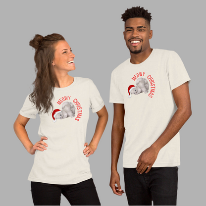 This Meowy Christmas shirt for adults features a large cartoon-style grey kitten with blue eyes in a red Santa hat and the phrase “Meowy Christmas” in festive lettering. Designed in unisex sizes XS–5XL, it’s soft, comfy, and great for matching family looks. Pair it with coordinating kids’ shirts, sweatshirts, or a matching holiday blanket. Ideal for cat lovers, funny family Christmas photos, or stocking stuffers.