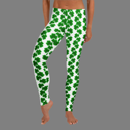 Image: St Patricks Day Leggings for toddler girls, tween, teens and women.Celebrate March in style with these women’s shamrock leggings featuring a chain of clovers on a clean white base. These leggings offer a mid-rise fit and full ankle-length cut, crafted from soft, stretchy fabric perfect for St. Patrick’s Day gatherings, parades, or casual wear. Pair with matching kids' leggings for a fun family celebration look. Available in sizes XS to XL.