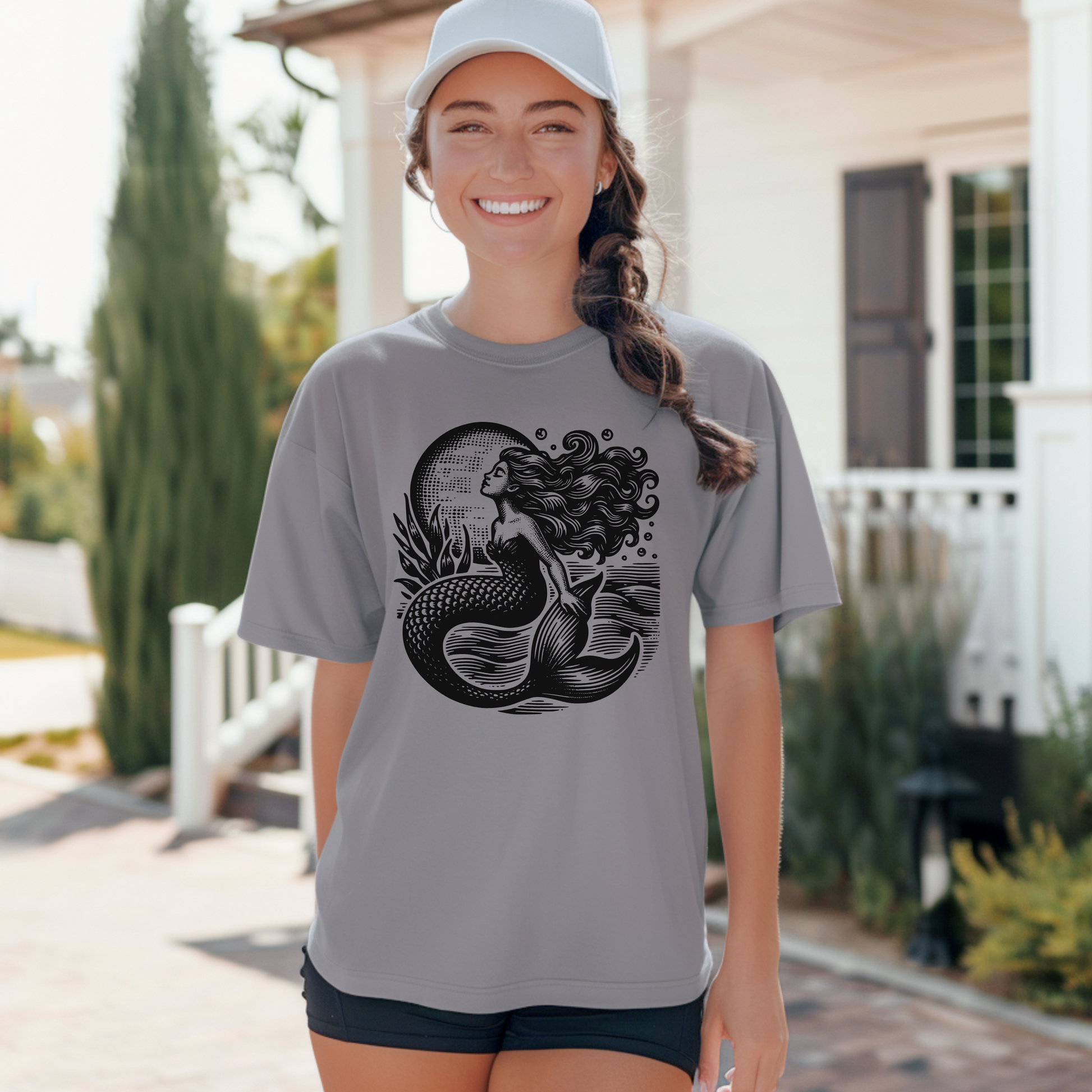 Image: Vintage Nautical Mermaid T-shirt on Comfort Colors, showcasing a detailed antique mermaid illustration. This tee embodies the essence of mermaidcore and coastal cowgirl styles, with a nod to the fisherman aesthetic. Perfect for seaside adventures, casual gatherings, or as a unique gift for ocean enthusiasts, by jaecrece.