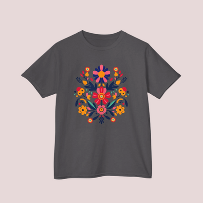 Floral Otomi Folk Art Girls’ T-shirt in sizes XS–XL featuring bright colors and a bold print inspired by Mexican heritage. This youth crew neck tee is made from soft, ethically sourced cotton and offers a breathable fit perfect for play, travel, or events. A stylish yet meaningful gift for girls who love cultural fashion, Latinx identity, or vibrant boho designs rooted in folk art tradition.