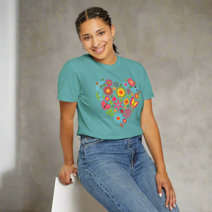 Romantic heart-shaped artwork featuring an arrangement of dragonflies, butterflies, and vibrant flowers. This nature-inspired floral heart is perfect for springtime gifts, Valentine’s cards, boho nursery prints, or garden-themed branding. Beautifully detailed and filled with organic charm, this graphic captures love through the language of blossoms and winged creatures.