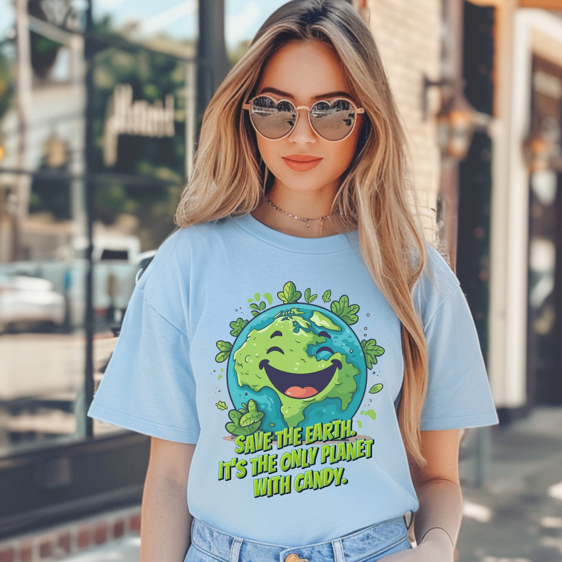 Funny Earth Day shirt for adults featuring a happy smiling cartoon planet Earth surrounded by green leaves and the message Save Earth! It’s the only planet with candy! This colorful environmental shirt is a playful choice for Earth Day celebrations, nature lovers, environmentalists, teachers and anyone who wants a funny graphic tee with a positive message.