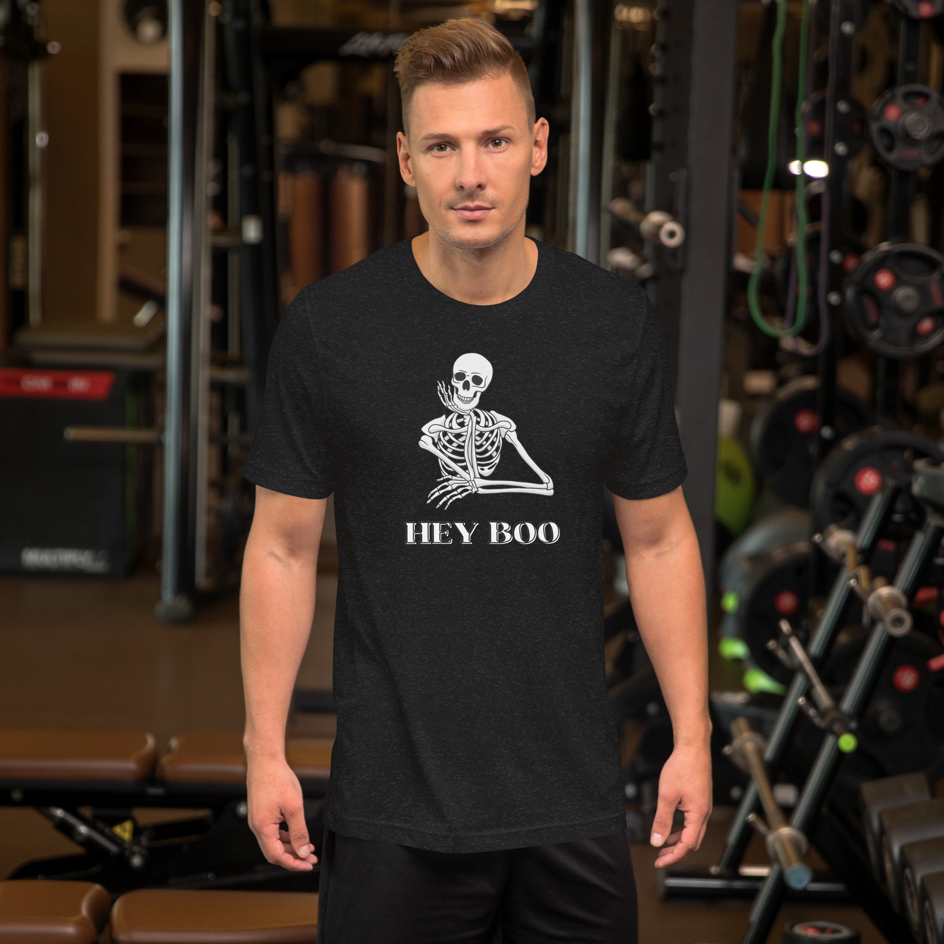 Celebrate Halloween with a playful twist in this Hey Boo Skeleton T-Shirt, designed on Bella Canvas 3001 in Black Heather. Featuring a flirty skeleton illustration and the fun phrase “Hey Boo,” this unisex tee is available in XS–5XL for a flattering fit for everyone. Ideal as a Halloween party shirt, trick-or-treat outfit, or cozy fall staple, this funny skeleton shirt combines comfort, durability, and spooky charm for the season.