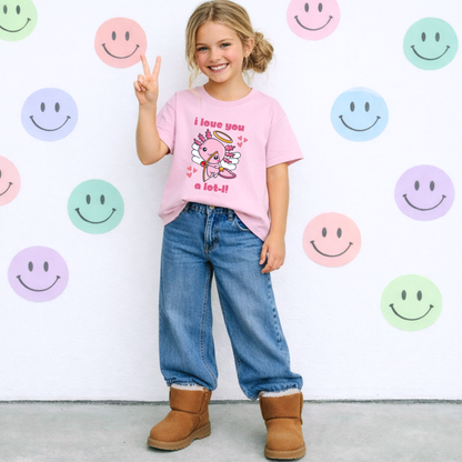 Adorable axolotl T shirt for kids featuring a playful Valentine design with a cupid axolotl and I Love You a Lotl message. Fun animal lover shirt for Valentine’s Day parties, school celebrations, family photos, and everyday wear.