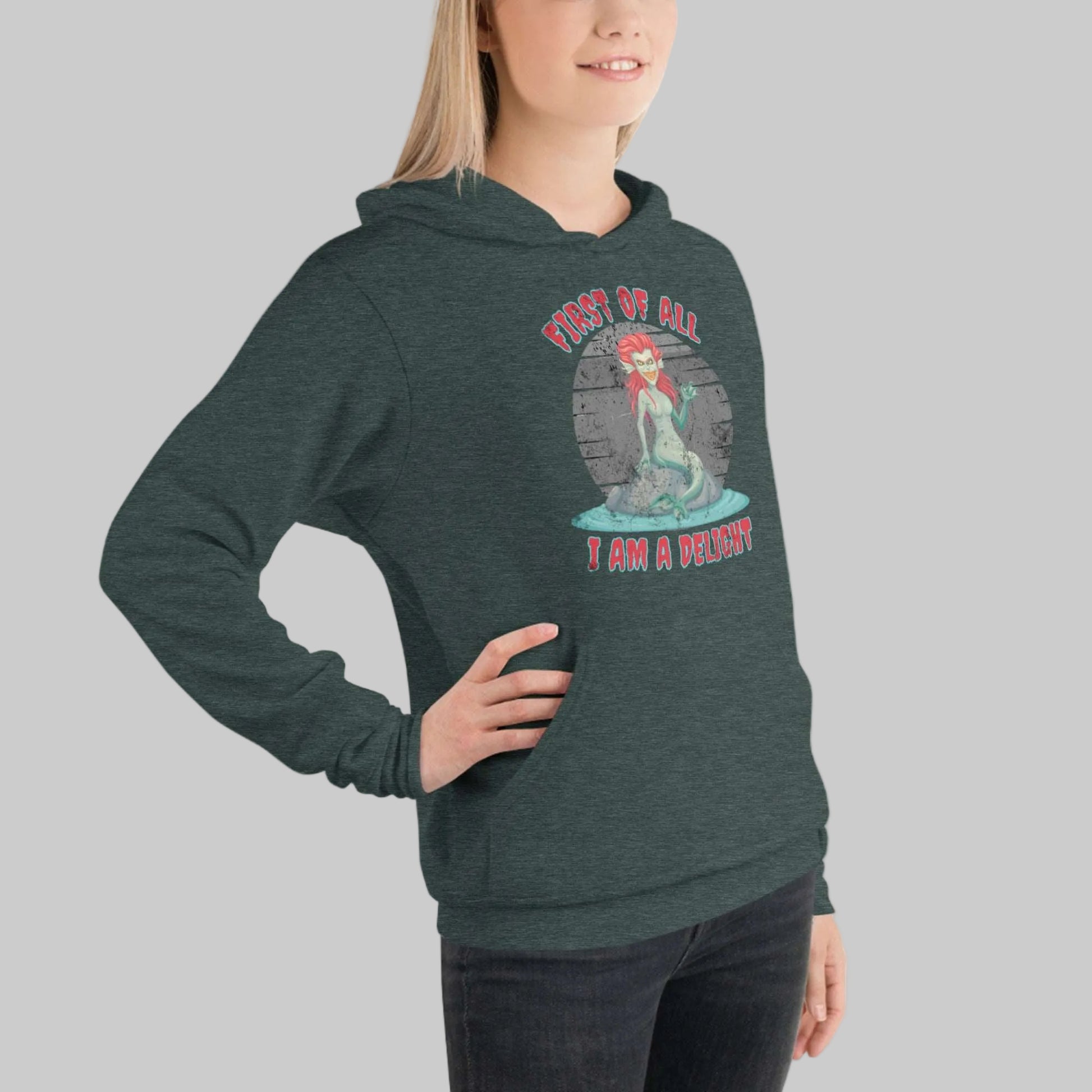 Graphic hoodie inspired by Greek siren mythology and bookish dark academia aesthetic, showcasing the phrase first of all I am a delight evil siren. This unisex hoodie combines cozy comfort with intellectual and gothic style.