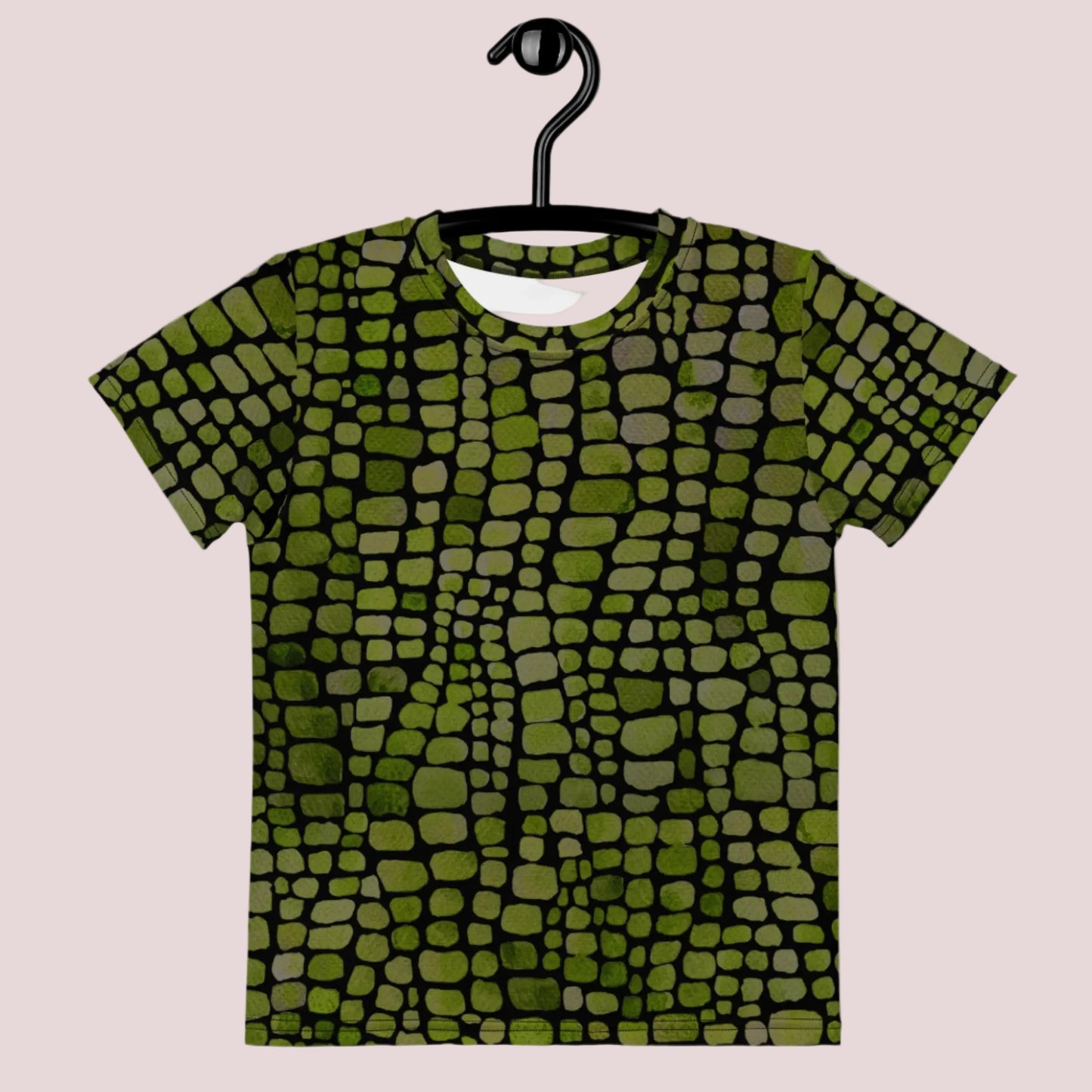 Green scale print kids shirt in sizes 2T–7, ideal for use as a base for lizard, dinosaur, snake, or serpent Halloween costumes. The all-over reptile design is eye-catching and fun, while the soft fabric ensures comfort for active kids. A great choice for birthday themes, jungle play, or classroom costume days. Perfect for unisex styling and kids who love creatures and nature play.