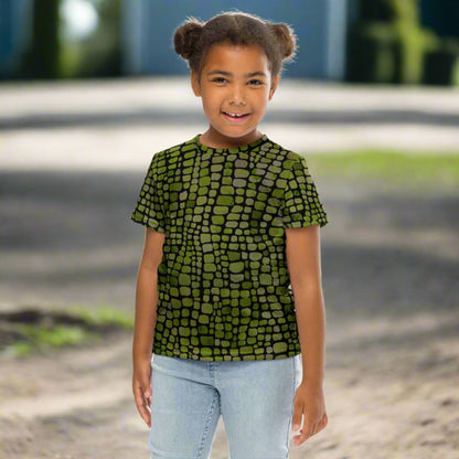 All-over reptile print kids t-shirt in green scale pattern, available in toddler sizes 2T–7. Great for dress-up, jungle animal costumes, and themed birthday parties. This shirt makes an excellent dinosaur or snake costume top and is soft, comfy, and easy to wear. A unique addition to any child’s wardrobe who loves reptiles, animals, and adventure. Great for school spirit weeks or Halloween fun.