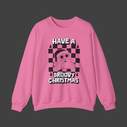 Fun Groovy Santa Sweatshirt for Christmas, designed with a retro Santa in flower sunglasses and peace sign pose, paired with a black checkerboard pattern and white “Have a Groovy Christmas” text. This holiday crewneck comes in bright Safety Pink and Safety Green, available in unisex sizes S–5XL. Perfect for vintage holiday outfits, retro Christmas gifts, family photo sweatshirts, or comfy holiday loungewear that spreads festive cheer.