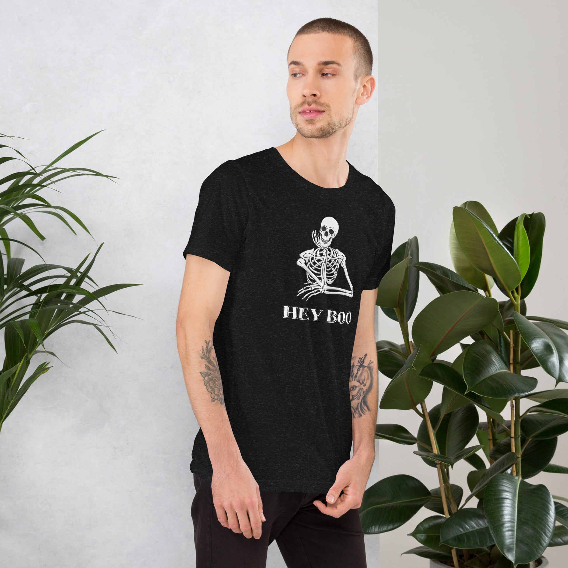 Funny Hey Boo Skeleton Halloween T-Shirt printed on Bella Canvas 3001 in Black Heather, available in XS–5XL. Designed for comfort and style, this unisex graphic tee features a flirty skeleton illustration and the phrase “Hey Boo.” Perfect for pumpkin patches, haunted houses, or Halloween parties, this spooky season shirt is lightweight, breathable, and versatile, making it a festive addition to your fall wardrobe.