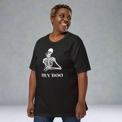 Unisex Hey Boo Skeleton Halloween Shirt for spooky season, printed on Bella Canvas 3001 Black Heather in sizes XS–5XL. Featuring a cheeky skeleton design with the words “Hey Boo,” this funny Halloween graphic tee is perfect for men and women who love playful fall fashion. Lightweight, soft, and pre-shrunk, it’s a go-to Halloween party shirt, trick-or-treat tee, or everyday fall wardrobe staple for celebrating the season with humor and style.