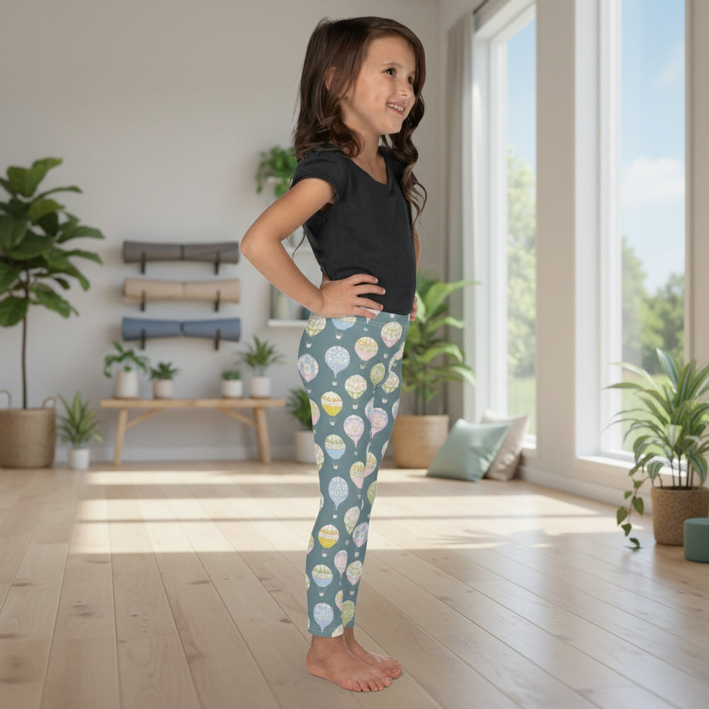 Girls leggings in sizes 2T–7 with a whimsical grey and pastel hot air balloon pattern. Soft, stretchy microfiber fabric ensures comfort for playdates, school days, or outdoor adventures. The elastic waistband provides easy wear, while the storybook-inspired Victorian design makes these leggings perfect for photo-ready outfits, festival fun, or matching mommy-and-me looks, giving toddlers a playful yet stylish wardrobe staple.