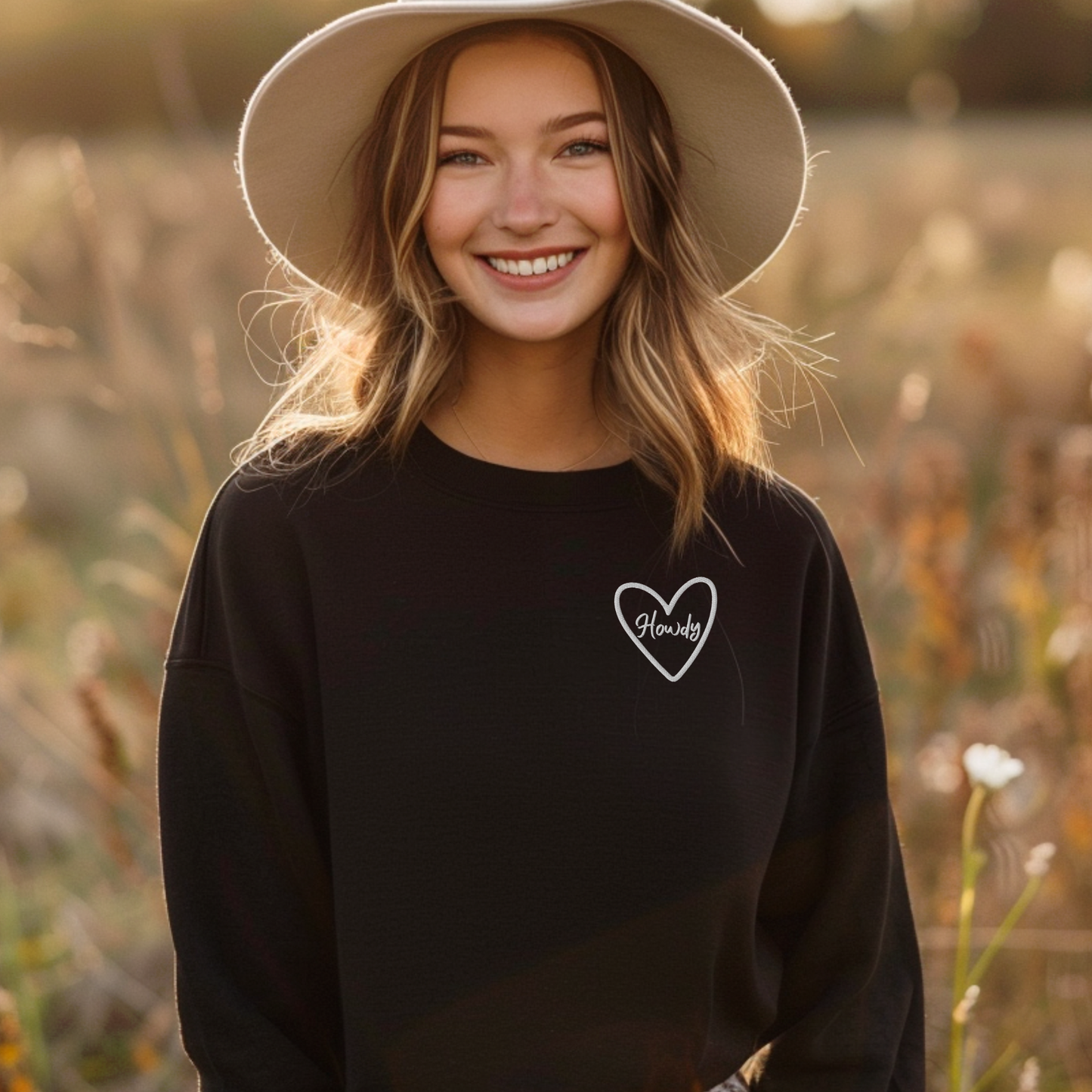 Embroidered Howdy sweatshirt made on Gildan 18000 heavy blend crewneck designed for game day style and comfort. Western inspired unisex sweatshirt with bold stitched lettering perfect for Texas college football games, tailgates, and stadium events. Cozy relaxed fit ideal for layering during fall sports season. Available in multiple colors including maroon, black, forest green, heliconia, and dark heather. Perfect sporty western outfit for women, students, and fans.