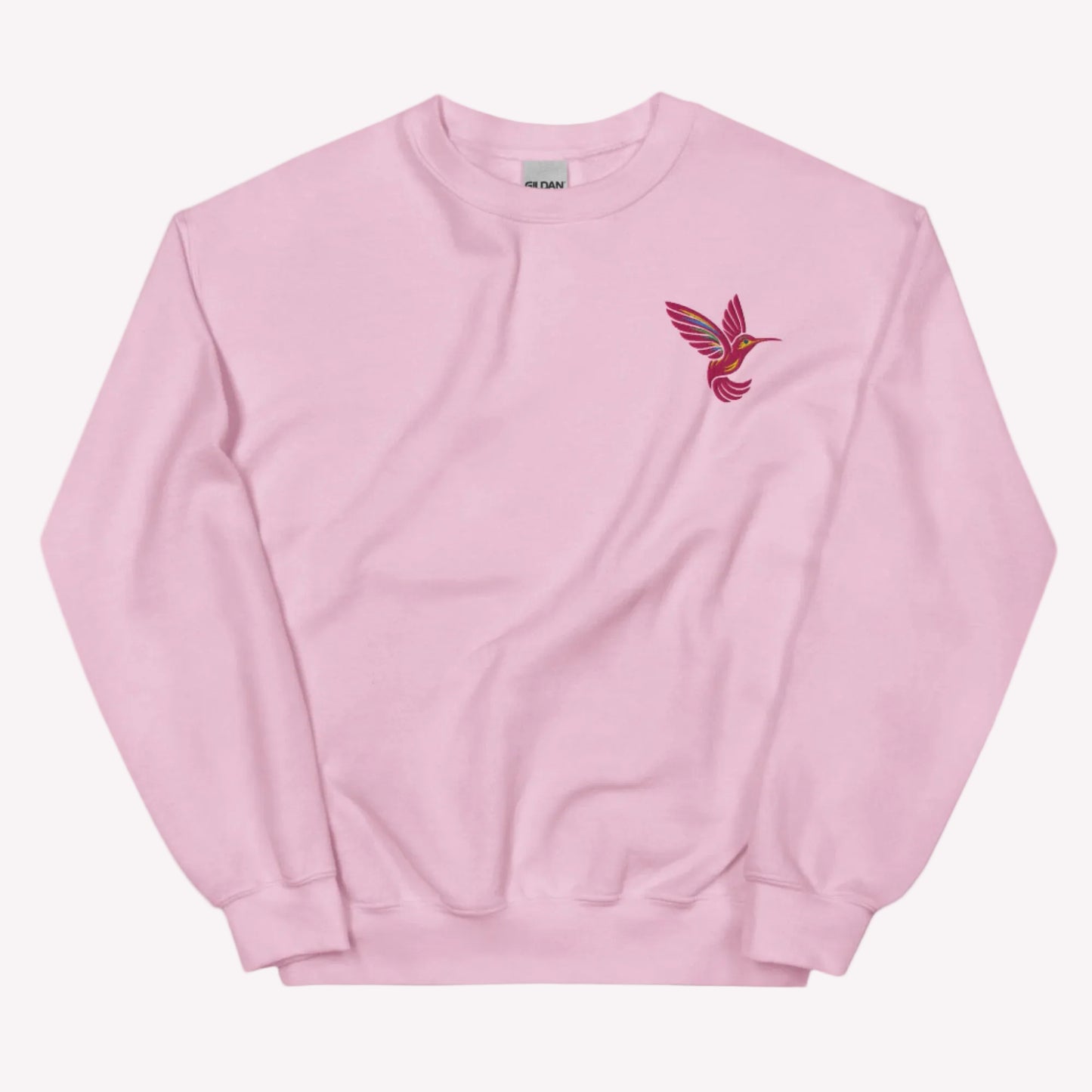 Hummingbird embroidered sweatshirt made on Gildan 18000 heavy blend crewneck with soft and cozy feel. Features detailed bird stitching for a subtle nature inspired look. Perfect for everyday wear, lounging, or casual outings. Great gift for bird lovers and women who enjoy cottagecore and botanical style. Available in sizes S to 5XL for relaxed fit comfort.