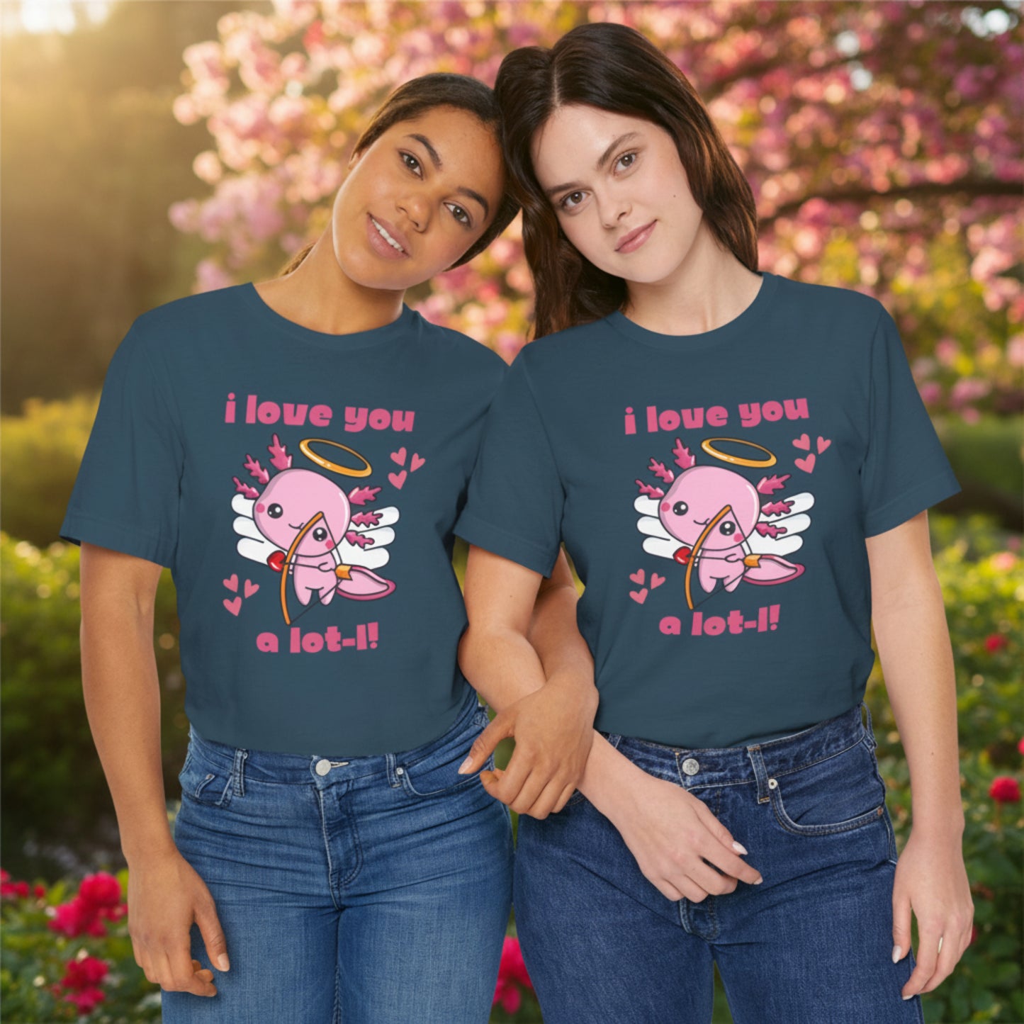 Two women wearing matching Deep Teal Bella Canvas 3001 tshirts outdoors featuring the I Love You A Lot L Axolotl Cupid design with a cute axolotl cupid and playful heart details. Soft unisex graphic tees shown in adult extended sizes XS to 5XL for an inclusive fit and comfortable everyday wear. Rich deep teal color stands out beautifully in natural light. Fun matching shirts for best friends, sisters, moms, girlfriends, Valentine outings, casual weekends, vacations, photo moments, or gifting.