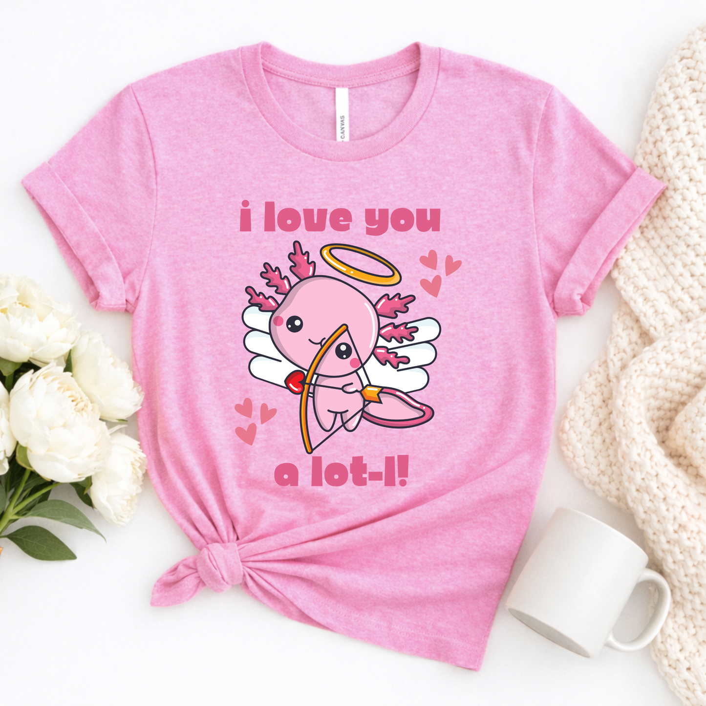 Heather Bubble Gum Bella Canvas 3001 tshirt with the I Love You A Lot L Axolotl Cupid design showing a cute axolotl cupid and heart details. Soft unisex graphic tee offered in adult sizes XS to 5XL with child sizes available for matching family looks. The cheerful bubble gum pink shade gives the shirt a playful trendy vibe that stands out in photos. Lightweight comfortable top for Valentine celebrations, girls trips, shopping days, birthdays, or gifts for lovers of fun animal tees.