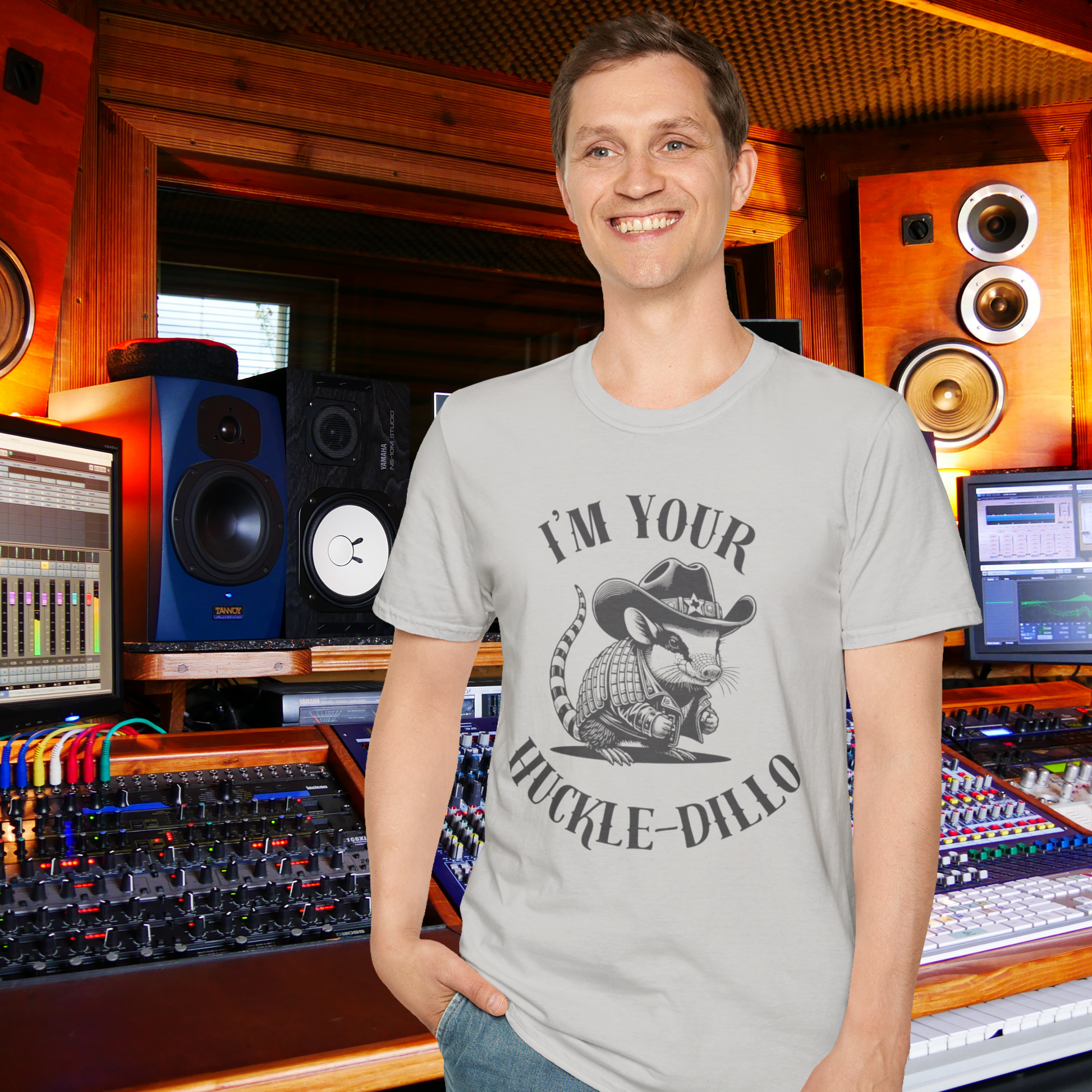 Image: A lighthearted armadillo T-shirt featuring a sheriff armadillo in a cowboy hat and a western jacket. The small Texas emblem on the hat adds a fun and stylish touch, making this a great tee for country lovers and animal fans alike. Whether worn as a Texas souvenir or as part of a casual western outfit, this humorous shirt is perfect for those who enjoy quirky and unique designs with a fun desert wildlife theme, by jaecrece.