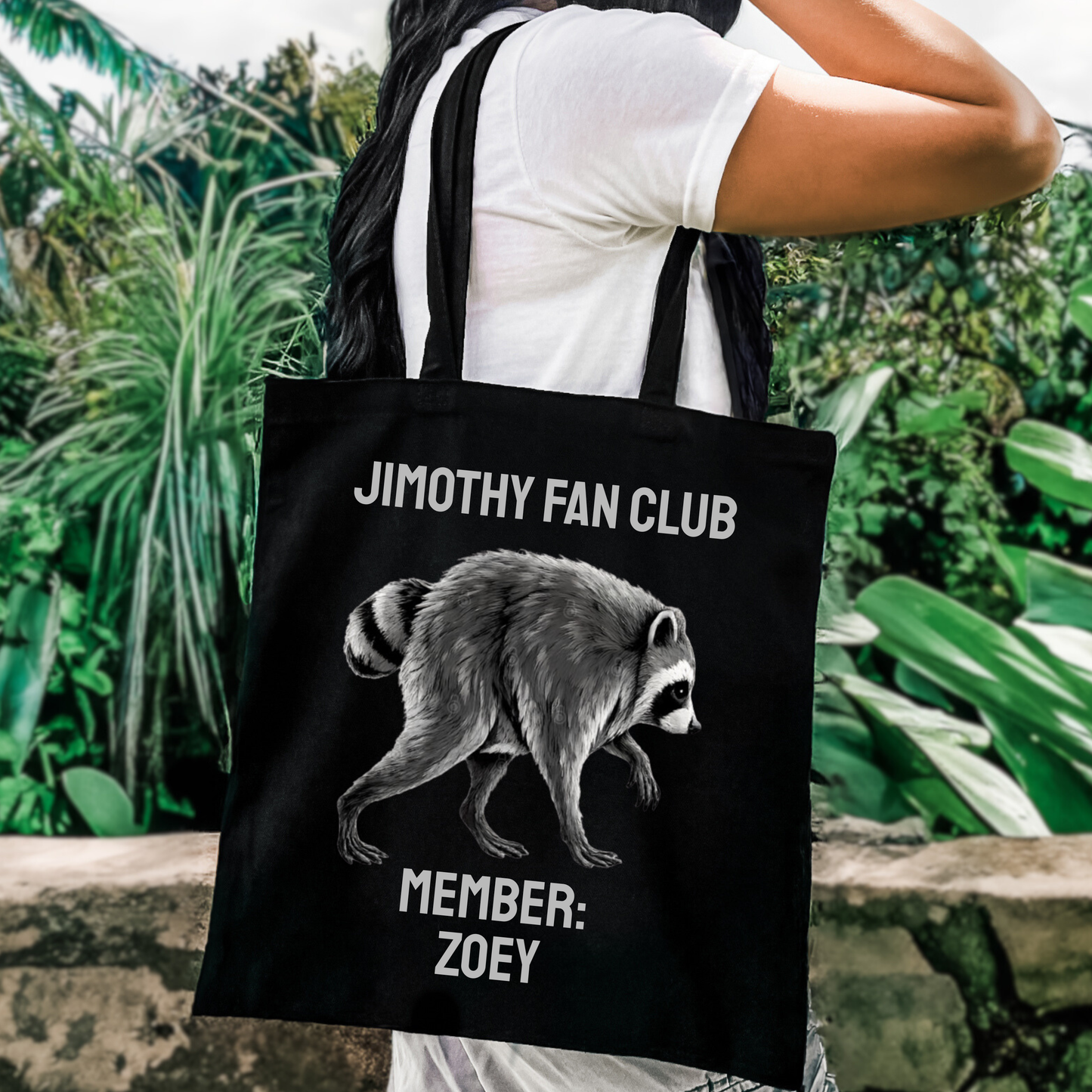 Jimothy Fan Club personalized raccoon tote bag in natural heavyweight cotton canvas featuring a playful illustrated raccoon and custom member name. Personalized tote bag for Jimothy fans, viral raccoon fans, Seattle animal lovers, and anyone who loves funny raccoon gifts.