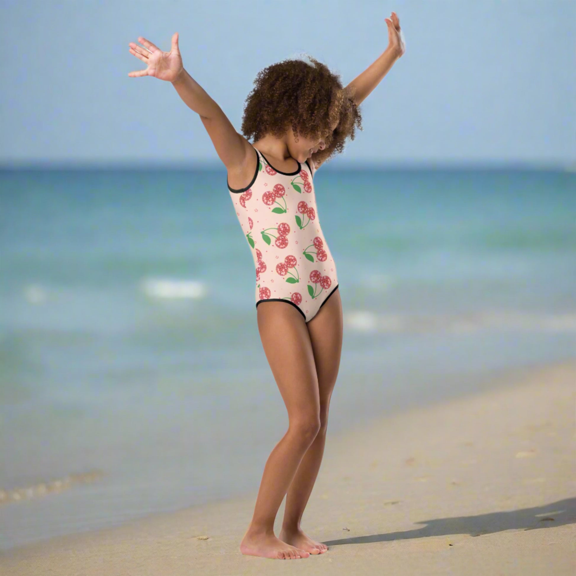 Kawaii cherry swimsuit for girls featuring a vintage inspired fruit print, perfect for kids who love colorful, cheerful swimwear styles.
