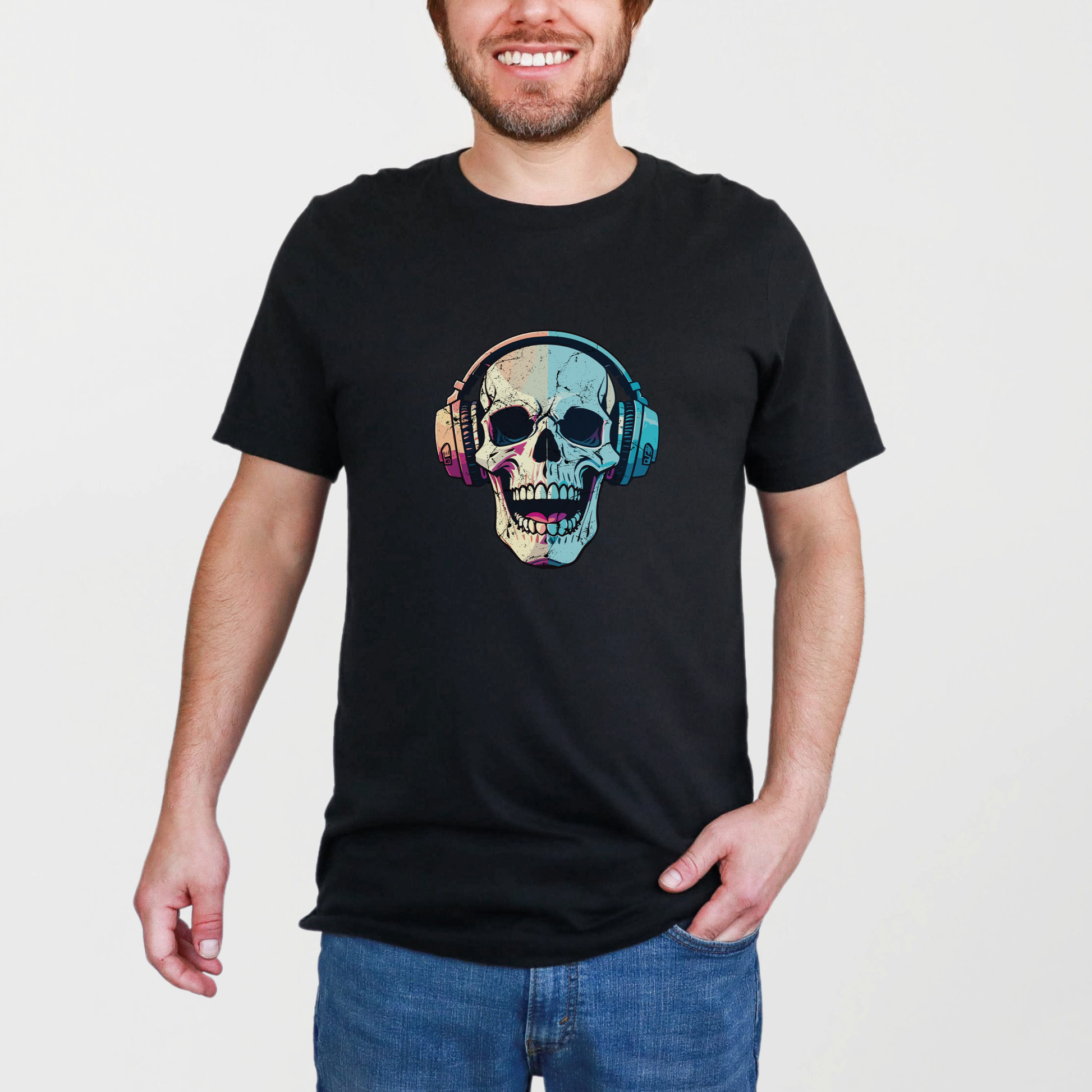 Man wearing a black unisex “Spooky Sounds” graphic t-shirt featuring a colorful laughing skull with headphones printed on the front. The bold design blends gothic, edgy streetwear with a music-inspired aesthetic, making it ideal for concerts, festivals, Halloween outfits, or everyday casual wear. Made from soft breathable cotton with a relaxed fit for all-day comfort. black skull graphic tee, Halloween music shirt, gothic t-shirt, skull headphones shirt, alternative streetwear clothing.