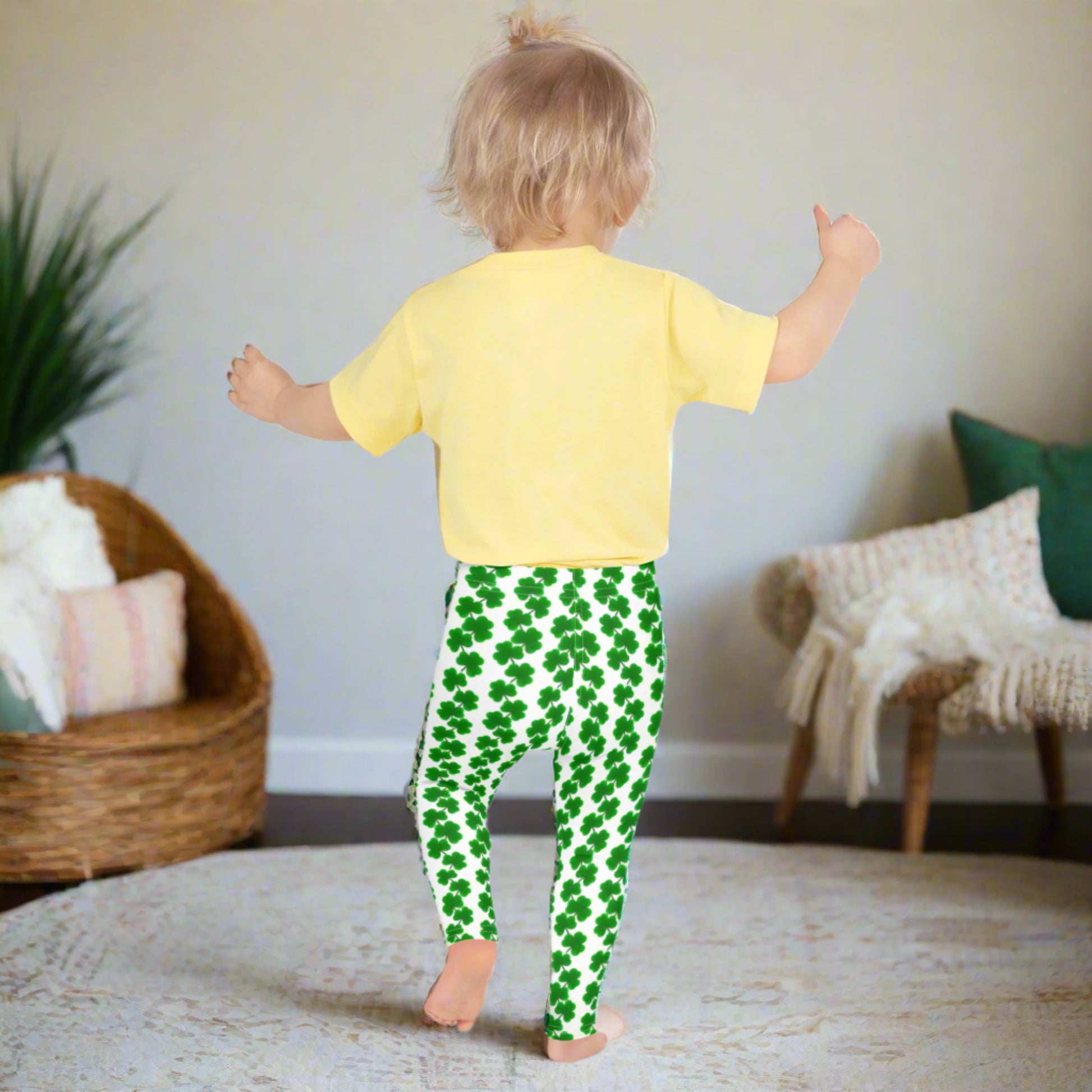 Image: St Patricks Day Leggings for toddlers and girls.Little girls will love these full-length shamrock leggings with a high-rise waist, featuring green clovers cascading down white fabric. These festive leggings come in sizes 2T–7 and are perfect for holiday events, March photo sessions, or matching family sets. Soft, stretchy, and adorable for all St. Patrick’s Day fun. Also available in tween girl and womens sizes for family matching outfits, by jaecrece