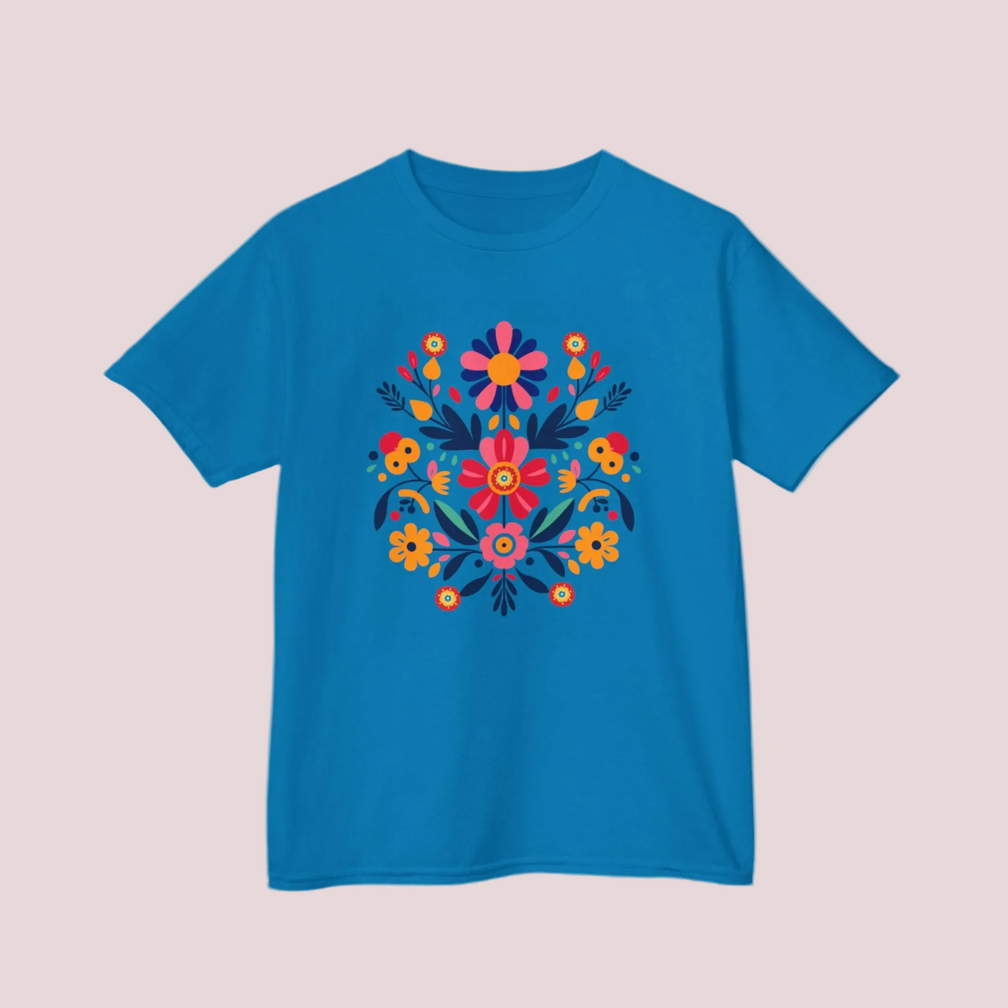 Girls’ Otomi T-shirt in soft midweight cotton featuring a bold floral and leaf print inspired by Mexican folk art. Available in youth sizes XS–XL, this classic crew neck top is perfect for school, summer outings, or family celebrations. With its bright artisan print and comfy fit, this kids’ tee is a go-to for Latinx cultural fashion, heritage clothing, or girls’ boho wardrobe staples.