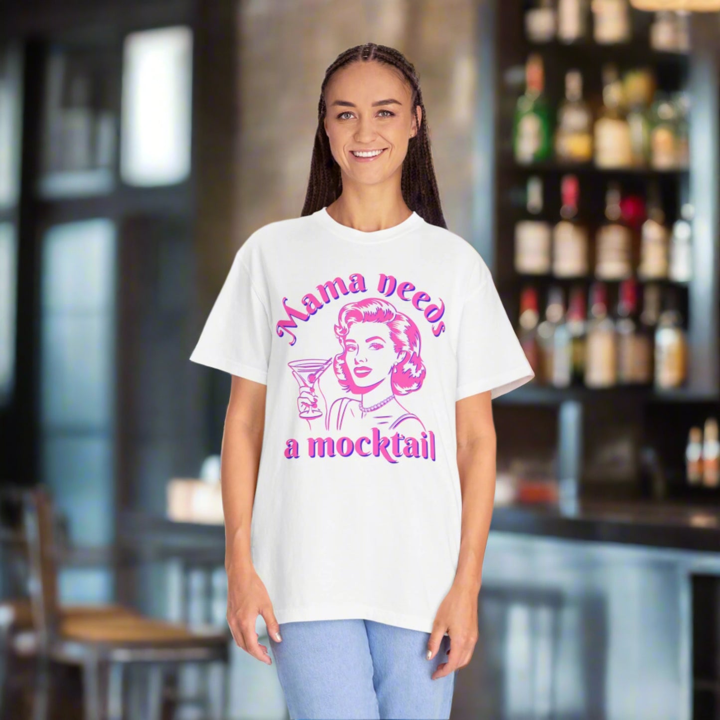 Image: Comfort Colors Mama Needs a Mocktail t-shirt, designed with a hot pink neon pop art style mom raising a glass. A witty and playful way to support a sober lifestyle, this tee is available in six fashionable colors. It makes a great gift for a mom-to-be, a friend celebrating a soberversary, or anyone who enjoys alcohol free fun. Soft, stylish, and perfect for any casual occasion, by jaecrece.