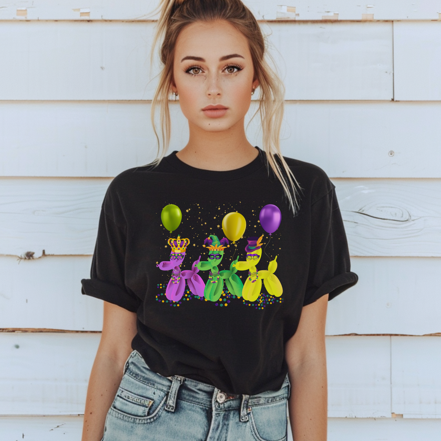 This eye-catching black Mardi Gras shirt features three balloon dogs in gold, green, and purple, framed by festive confetti accents. A fun, playful way to honor New Orleans culture and the joy of Fat Tuesday, this tee is perfect for French Quarter adventures, Bourbon Street parades, or year-round celebration wear. Sizes XS–5XL available for the whole krewe.